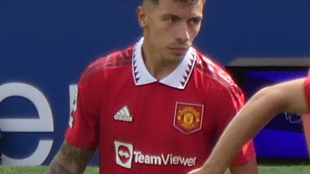 Lisandro Martínez playing for Manchester United at Old Trafford